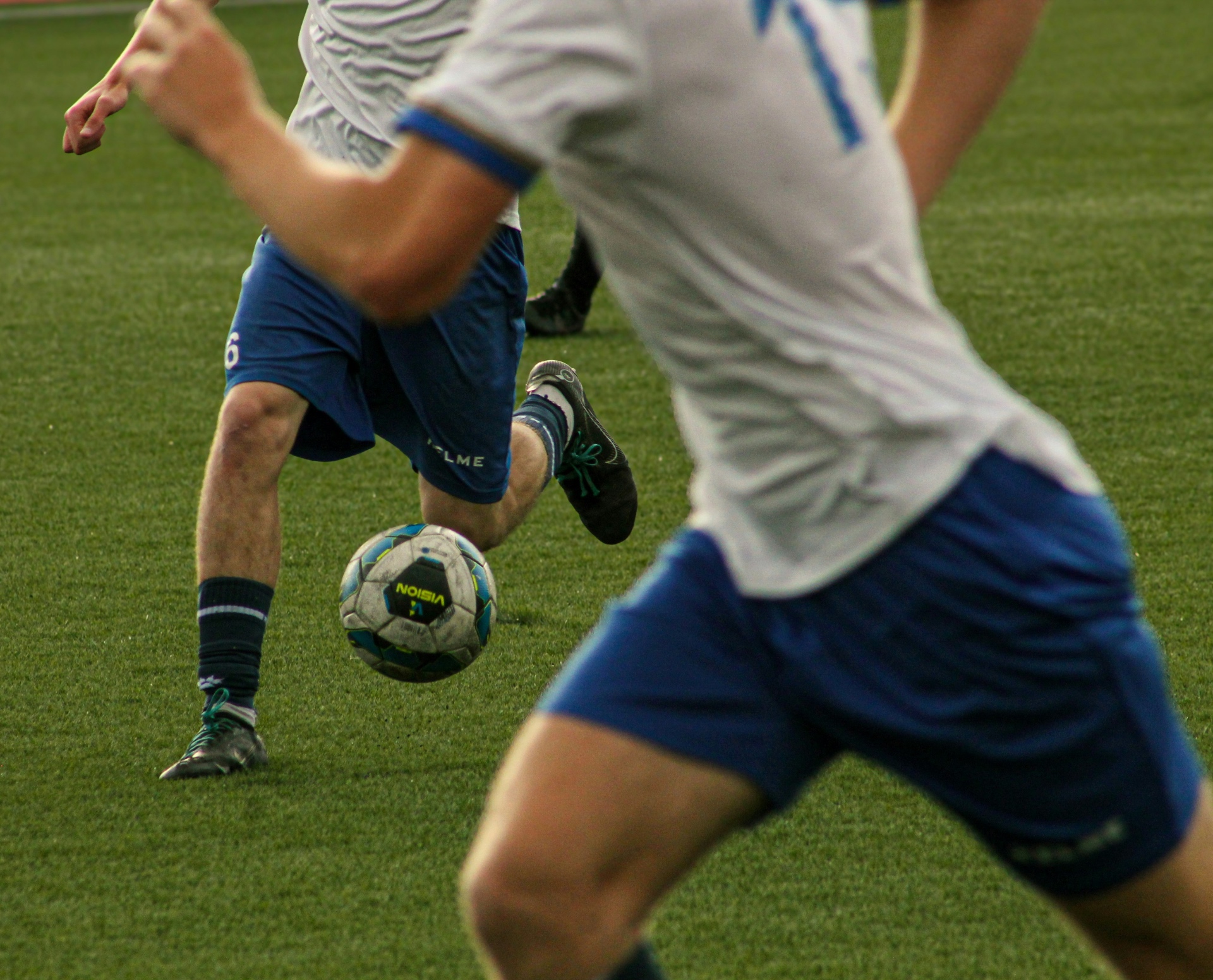Two players competing for the ball during a match