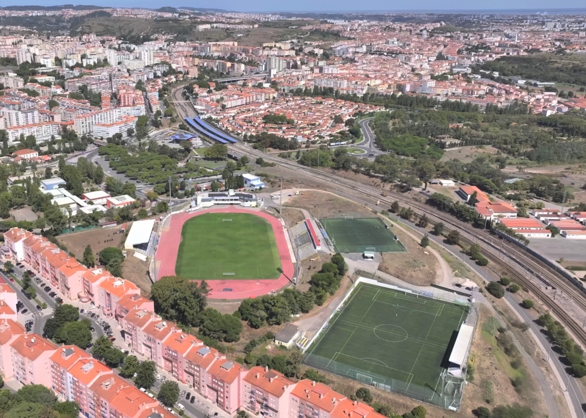 Aerial view of the Real Sports Club stadium and training pitches on the Lisbon coast